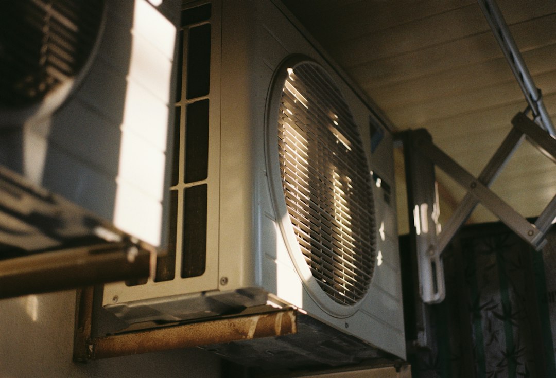 Outdoor air conditioning unit for condensate drain maintenance guide