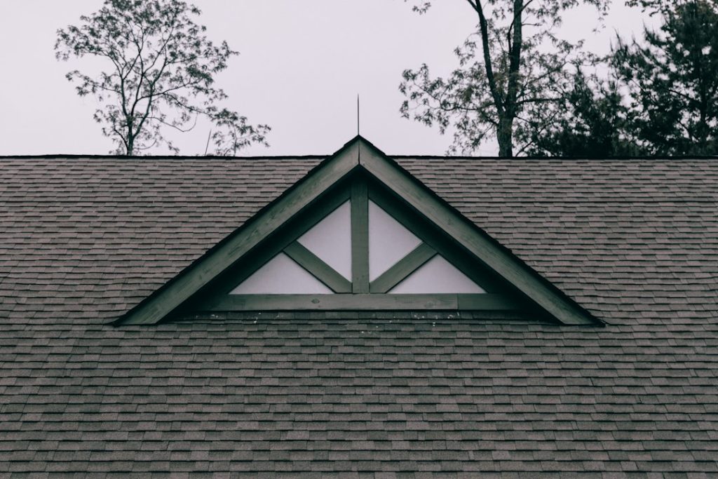 Residential roof with light-colored shingles