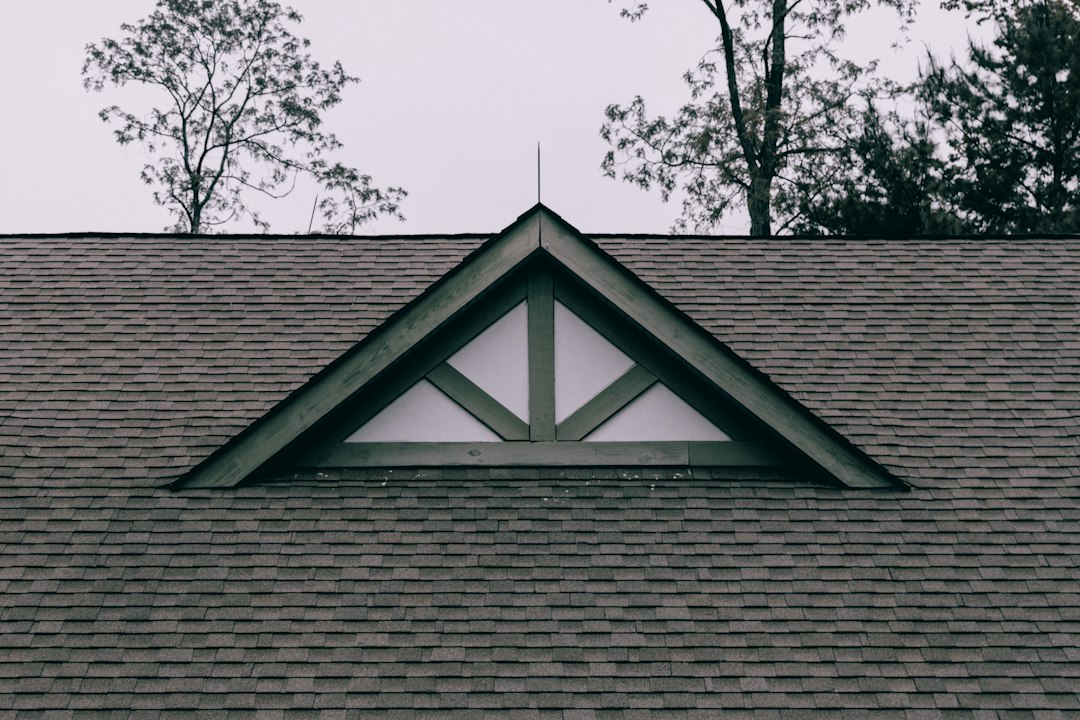Residential roof with light-colored shingles