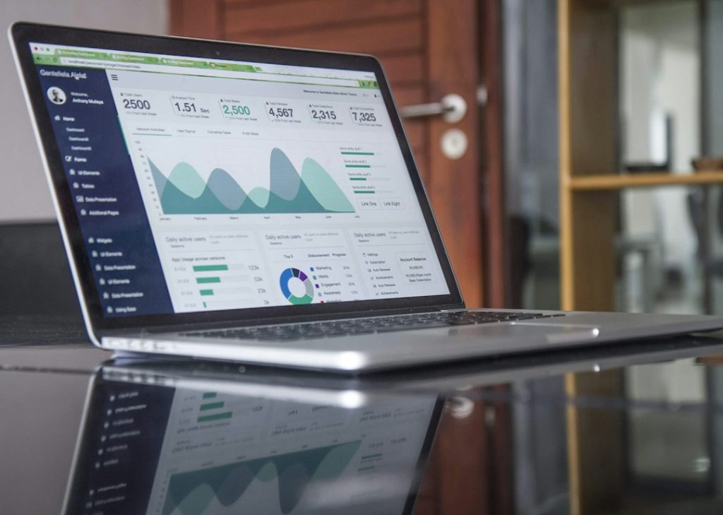 Laptop displaying financial information