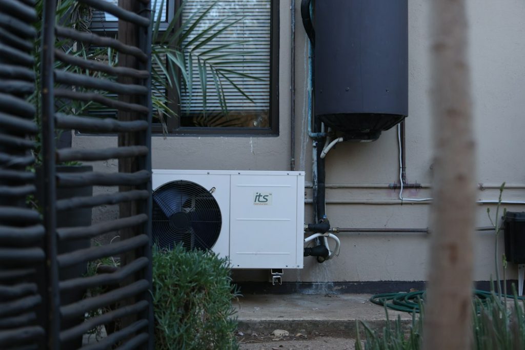 Outdoor HVAC equipment beside a home