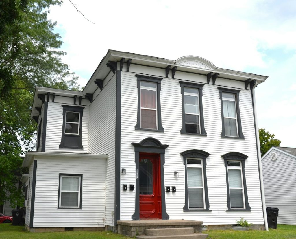Older home exterior prepared for renovation
