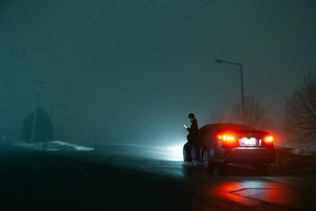 Car headlights in foggy night driving
