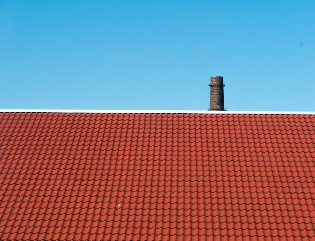 Residential roof with roof vents and penetrations