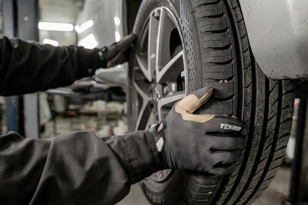 Mechanic working on a car tire