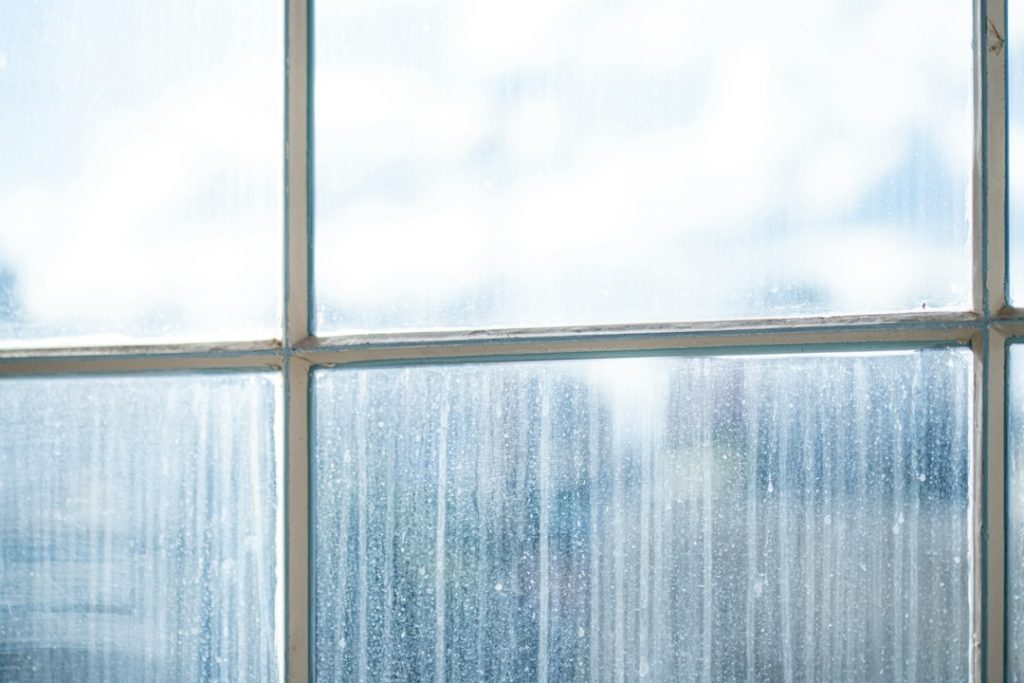 Rain on a home window for a window leak troubleshooting guide